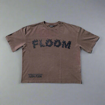 Brown t-shirt with 'FLOOM' branding on a studio background